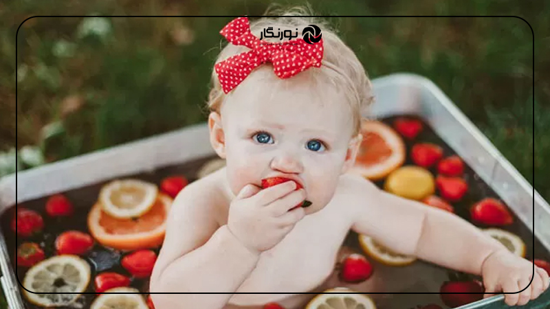 ژست عکس تابستانی نوزاد دختر