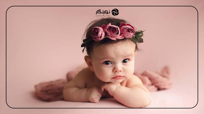 عکس نوزاد با تاج گل بهاری