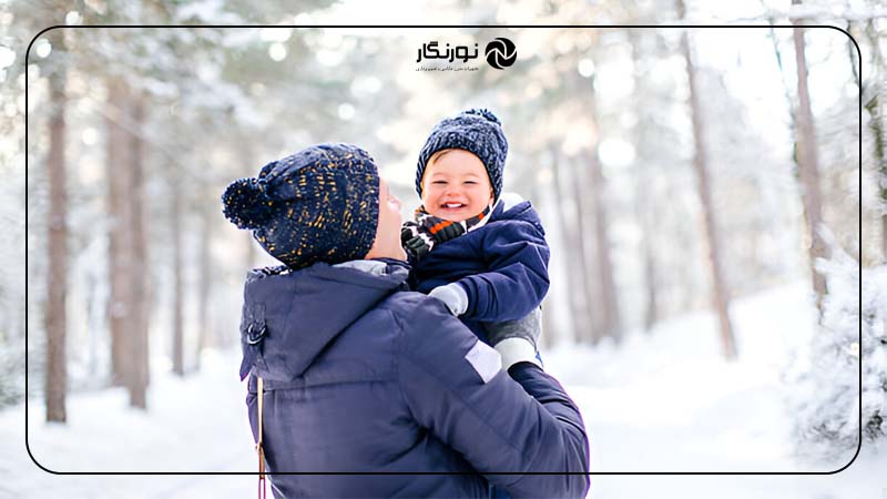 عکاسی از نوزاد در طبیعت برفی