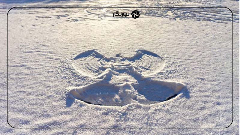 عکاسی از بال‌های فرشته در برف