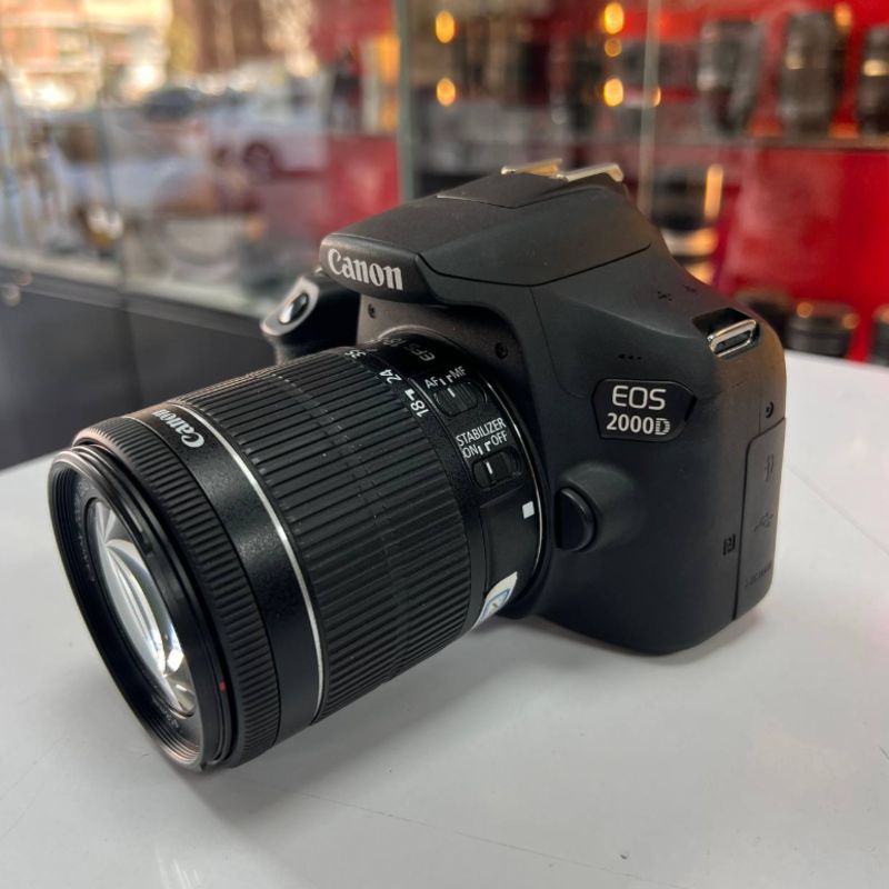 دوربین دست دوم Canon EOS 2000D kit EF-S 18-55mm IS STM  (1000 شات)