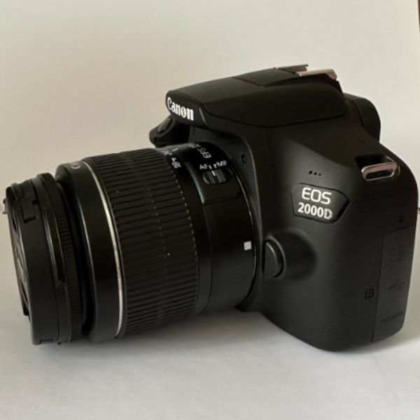 دوربین دست دوم Canon EOS 2000D kit EF-S 18-55mm III (9000 شات)
