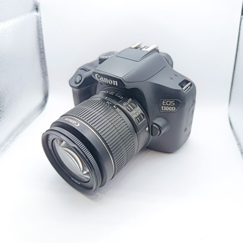 دوربین دست دوم کانن EOS 1300D kit 18-55mm IS II دارای لنز لرزشگیردار (16000 شات)
