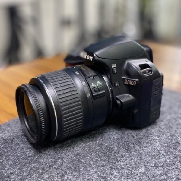 دوربین عکاسی نیکون دست دوم Nikon D3100 Kit 18-55mm f/3.5-5.6 G VR (11/000 شات)