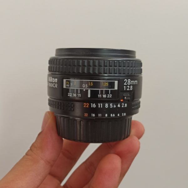 لنز دست دوم لنز نیکون مدل Nikon AF NIKKOR 28mm f/2.8D (جعبه دارد)