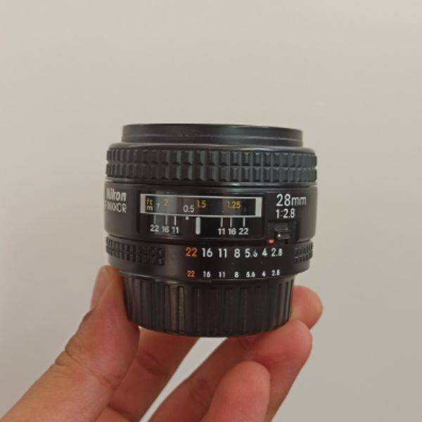 لنز دست دوم لنز نیکون مدل Nikon AF NIKKOR 28mm f/2.8D (جعبه دارد)