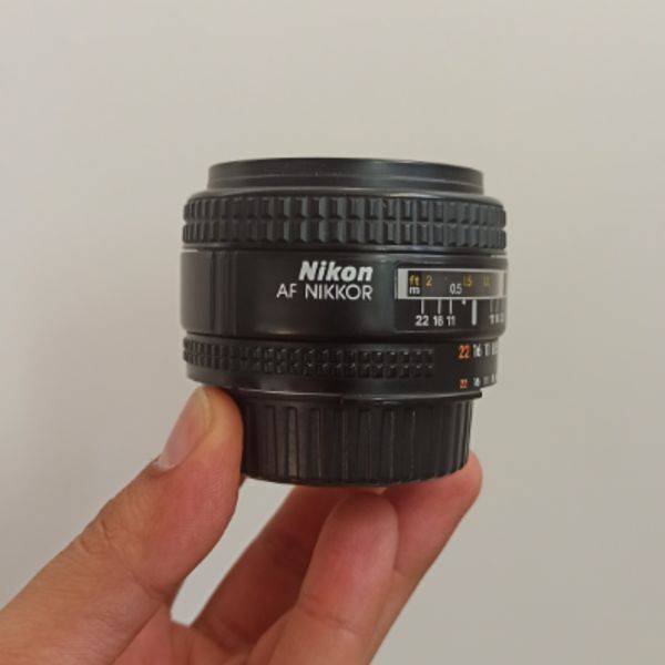 لنز دست دوم لنز نیکون مدل Nikon AF NIKKOR 28mm f/2.8D (جعبه دارد)