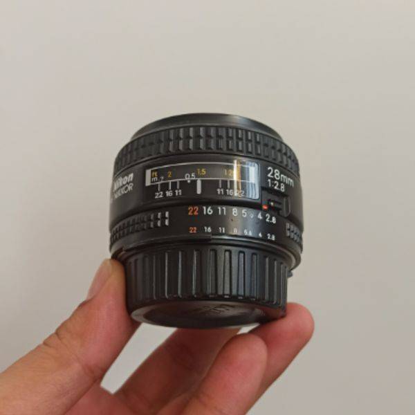 لنز دست دوم لنز نیکون مدل Nikon AF NIKKOR 28mm f/2.8D (جعبه دارد)