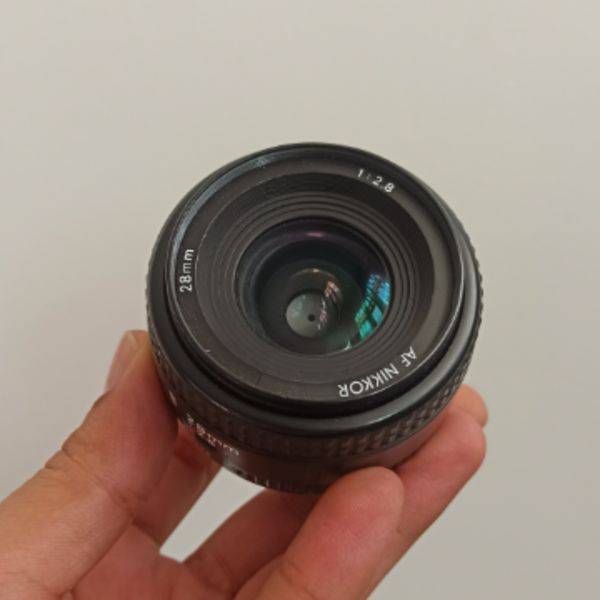 لنز دست دوم لنز نیکون مدل Nikon AF NIKKOR 28mm f/2.8D (جعبه دارد)